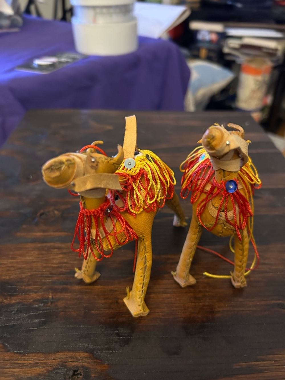 Handcrafted Leather Camel Figurines with Red and Yellow Tassels